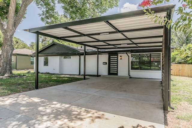 13516 Spring Grove Ave, Dallas, TX 75240 - view of front of property with brick siding and a detached carport