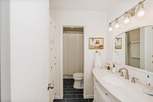 509 Whaley St, Bowie, TX 76230 - bathroom featuring tile patterned flooring, vanity, and a shower with curtain