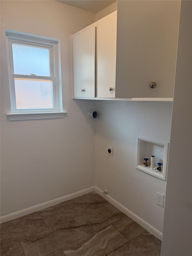 4005 Tacoma St, Irving, TX 75062 - laundry room featuring electric dryer hookup, washer hookup, cabinet space, and gas dryer hookup