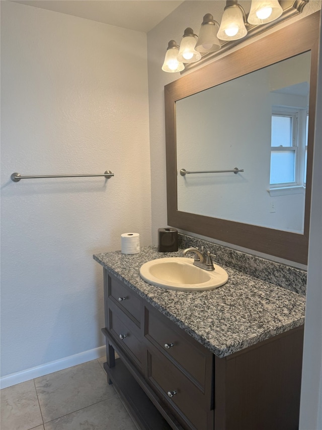 4005 Tacoma St, Irving, TX 75062 - bathroom with vanity and tile patterned flooring