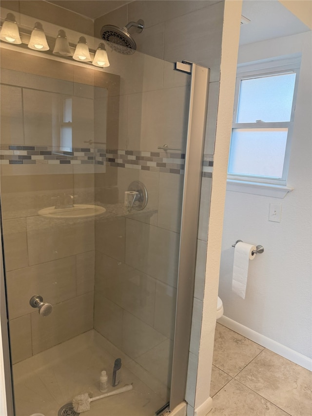 4005 Tacoma St, Irving, TX 75062 - bathroom with a shower stall and tile patterned flooring