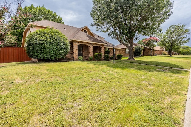 947 Aspen Dr, Desoto, TX 75115 - view of front of house with brick siding and roof with shingles