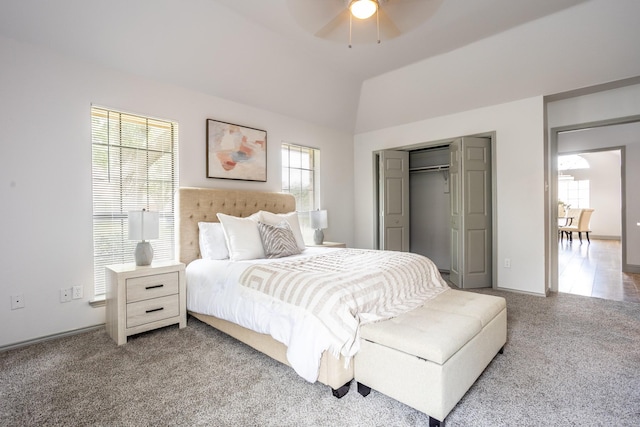 947 Aspen Dr, Desoto, TX 75115 - bedroom featuring multiple windows, carpet, a closet, vaulted ceiling, and ceiling fan