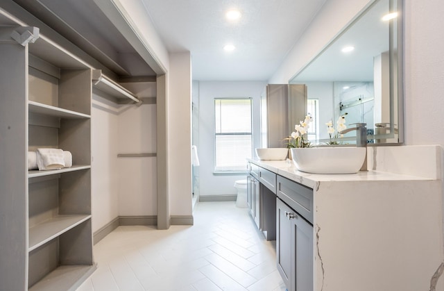 947 Aspen Dr, Desoto, TX 75115 - full bathroom featuring vanity, a stall shower, recessed lighting, and tile patterned flooring