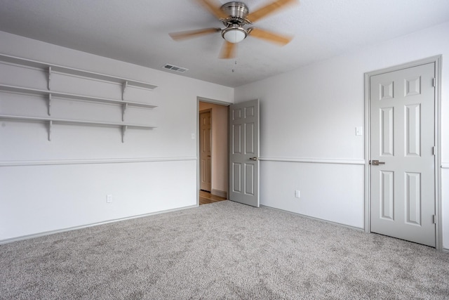 947 Aspen Dr, Desoto, TX 75115 - unfurnished bedroom featuring carpet and ceiling fan