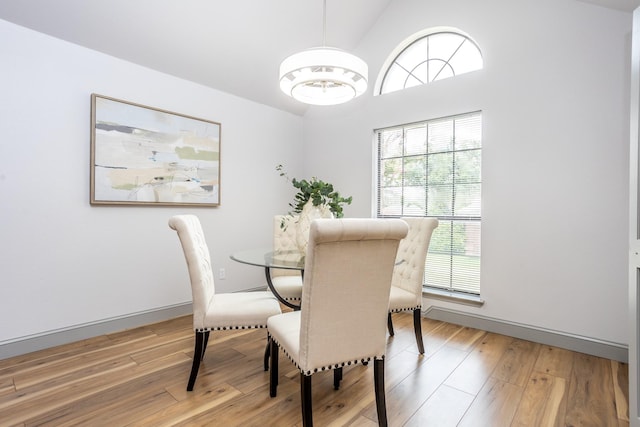 947 Aspen Dr, Desoto, TX 75115 - dining room featuring light wood-style floors and high vaulted ceiling