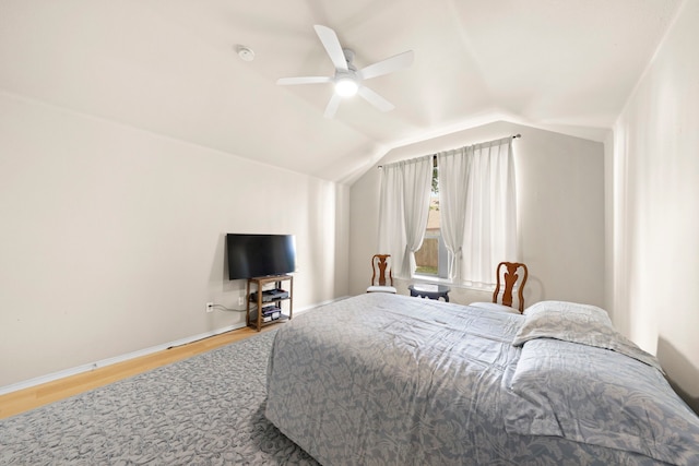 90 Elmwood Trl, Waxahachie, TX 75165 - bedroom with wood finished floors, vaulted ceiling, and a ceiling fan
