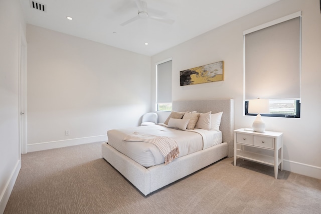 424 Regal Ln, Irving, TX 75039 - bedroom with carpet, multiple windows, a ceiling fan, and recessed lighting