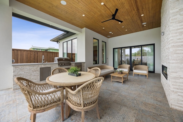 424 Regal Ln, Irving, TX 75039 - view of patio / terrace featuring area for grilling, outdoor dining area, and a ceiling fan