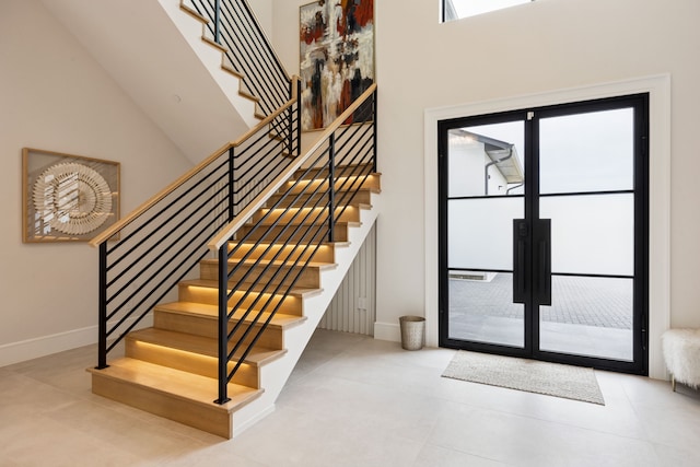 424 Regal Ln, Irving, TX 75039 - stairs featuring plenty of natural light and tile patterned flooring