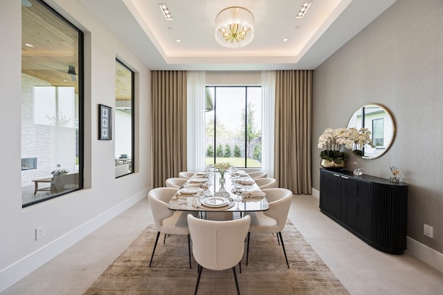 424 Regal Ln, Irving, TX 75039 - dining space with a chandelier and a tray ceiling