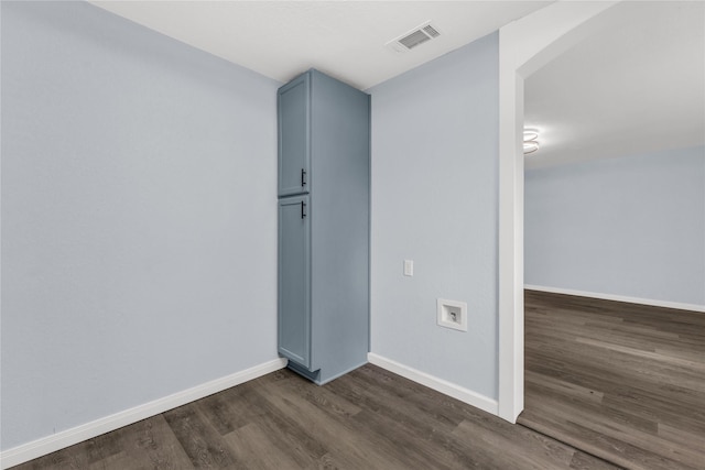 301 E Craven Ave, Lacy Lakeview, TX 76705 - spare room featuring dark wood-type flooring and baseboards