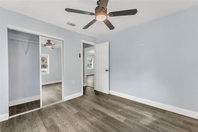 301 E Craven Ave, Lacy Lakeview, TX 76705 - unfurnished bedroom featuring wood finished floors, a closet, and a ceiling fan