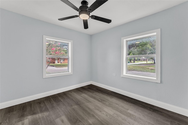 301 E Craven Ave, Lacy Lakeview, TX 76705 - empty room with healthy amount of natural light, dark wood finished floors, and ceiling fan