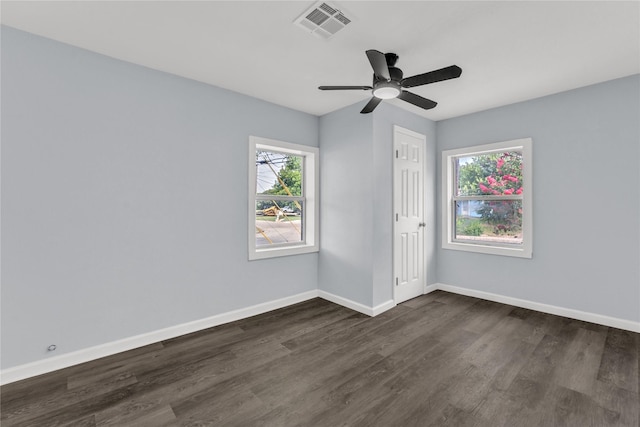 301 E Craven Ave, Lacy Lakeview, TX 76705 - empty room featuring dark wood-style flooring and a ceiling fan