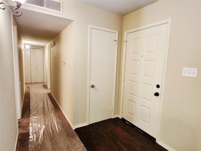 1408 Bandera Dr, Arlington, TX 76018 - hall featuring dark wood finished floors and baseboards