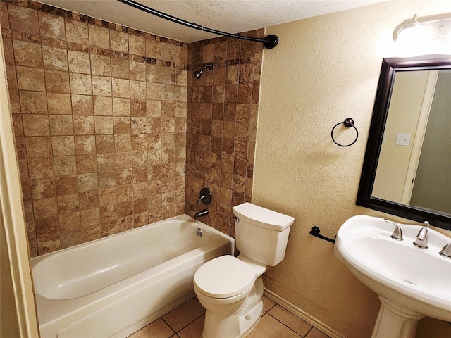 1408 Bandera Dr, Arlington, TX 76018 - bathroom featuring tile patterned flooring, shower / bathtub combination, and a textured ceiling