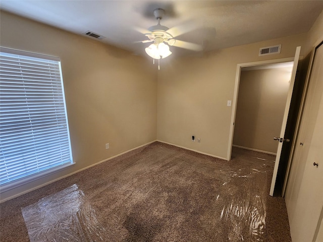 1408 Bandera Dr, Arlington, TX 76018 - carpeted spare room with ceiling fan and baseboards