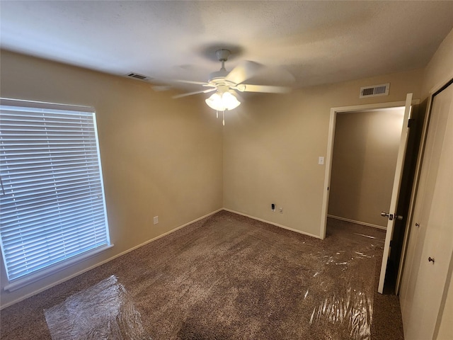 1408 Bandera Dr, Arlington, TX 76018 - spare room with ceiling fan and carpet floors