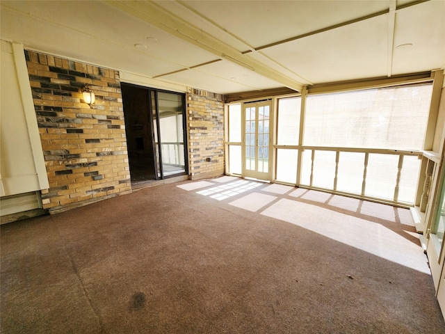 1408 Bandera Dr, Arlington, TX 76018 - spare room featuring carpet and brick wall