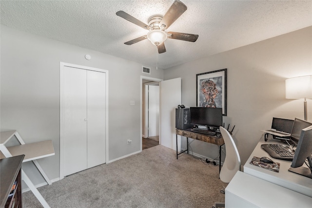 2416 Raintree Ct, Plano, TX 75074 - carpeted office space featuring ceiling fan and a textured ceiling