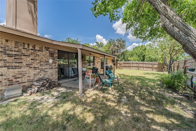 2416 Raintree Ct, Plano, TX 75074 - fenced backyard with a patio area