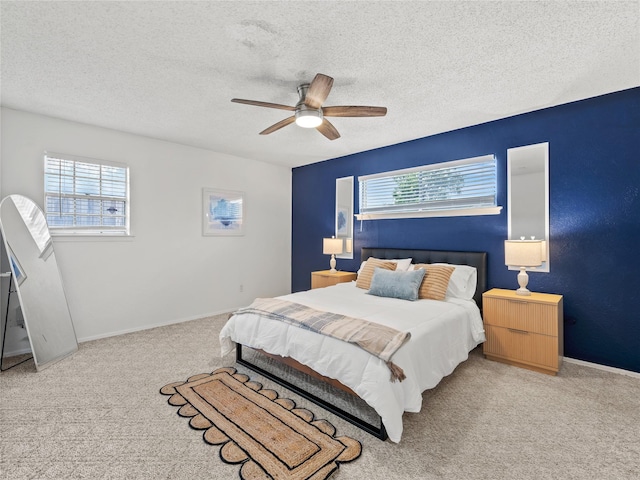2012 Westlake Dr, Plano, TX 75075 - bedroom with carpet, a textured ceiling, and a ceiling fan