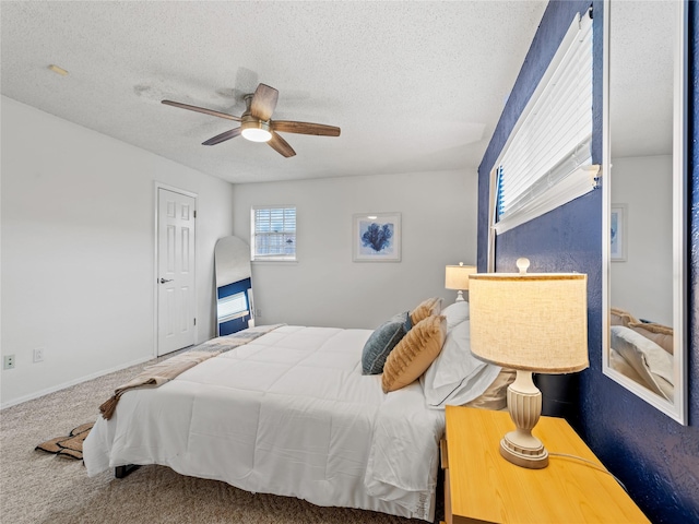 2012 Westlake Dr, Plano, TX 75075 - bedroom with a textured ceiling, carpet flooring, and ceiling fan