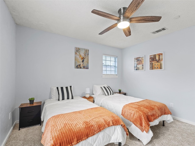 2012 Westlake Dr, Plano, TX 75075 - bedroom with carpet flooring, a ceiling fan, and a textured ceiling