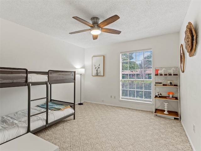 2012 Westlake Dr, Plano, TX 75075 - unfurnished bedroom featuring carpet, a textured ceiling, and ceiling fan