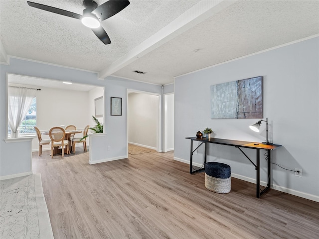 2012 Westlake Dr, Plano, TX 75075 - home office with a textured ceiling, wood finished floors, crown molding, ceiling fan, and beamed ceiling