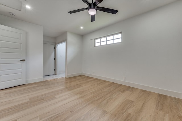 2504 Wicker Ave, Farmers Branch, TX 75234 - unfurnished bedroom with light wood-style floors, ceiling fan, and recessed lighting