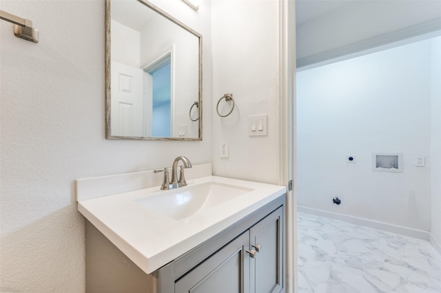 2504 Wicker Ave, Farmers Branch, TX 75234 - bathroom featuring marble look tiles and vanity