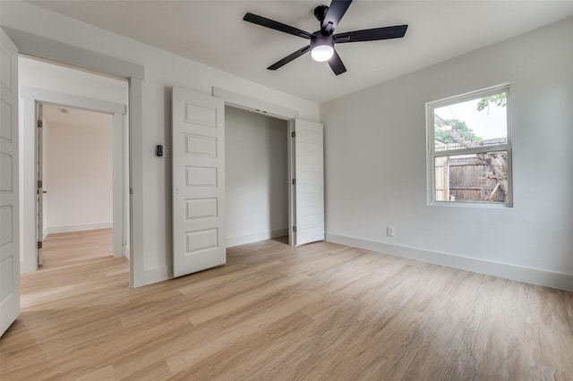 2504 Wicker Ave, Farmers Branch, TX 75234 - unfurnished bedroom featuring light wood-style flooring and ceiling fan