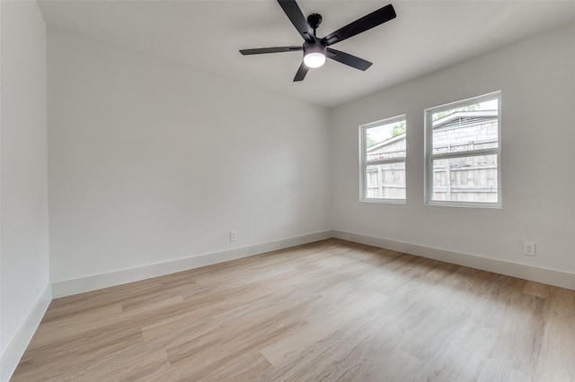 2504 Wicker Ave, Farmers Branch, TX 75234 - unfurnished room with light wood finished floors and ceiling fan