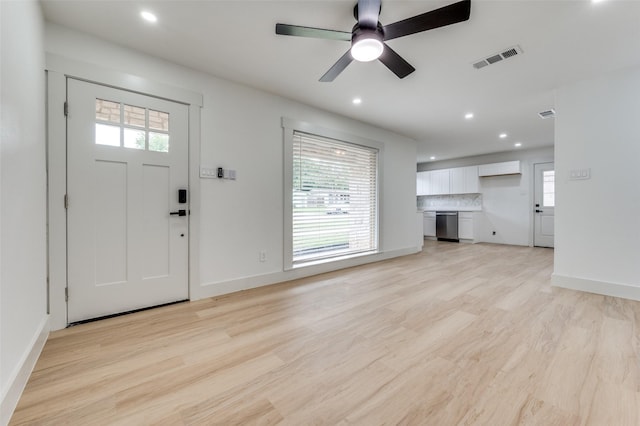 2504 Wicker Ave, Farmers Branch, TX 75234 - unfurnished living room with light wood finished floors, recessed lighting, and ceiling fan