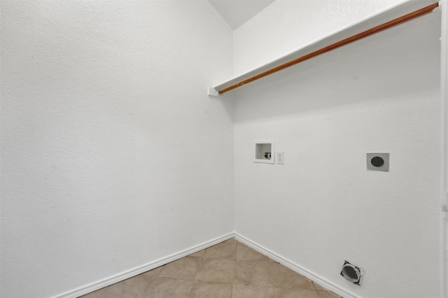 5900 Rising Meadow Dr, Arlington, TX 76018 - laundry area with hookup for a washing machine, hookup for an electric dryer, and light tile patterned flooring
