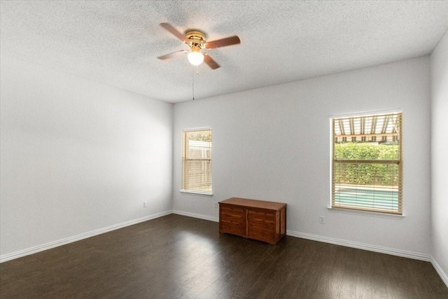 2826 Garden Oaks Pl, Grand Prairie, TX 75052 - unfurnished room with a ceiling fan, wood finished floors, and a textured ceiling