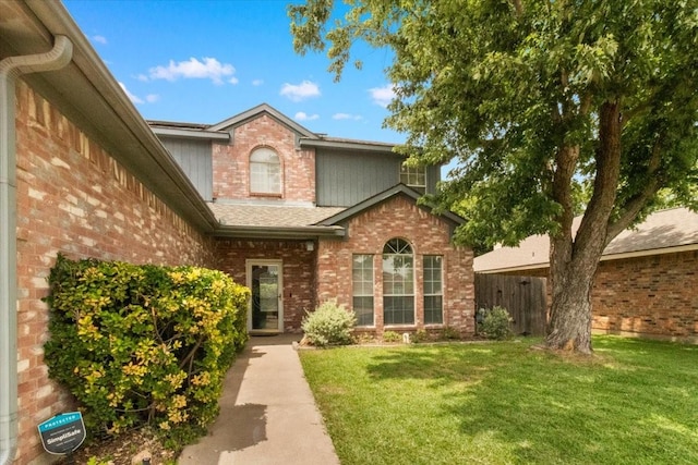 2826 Garden Oaks Pl, Grand Prairie, TX 75052 - view of exterior entry with brick siding