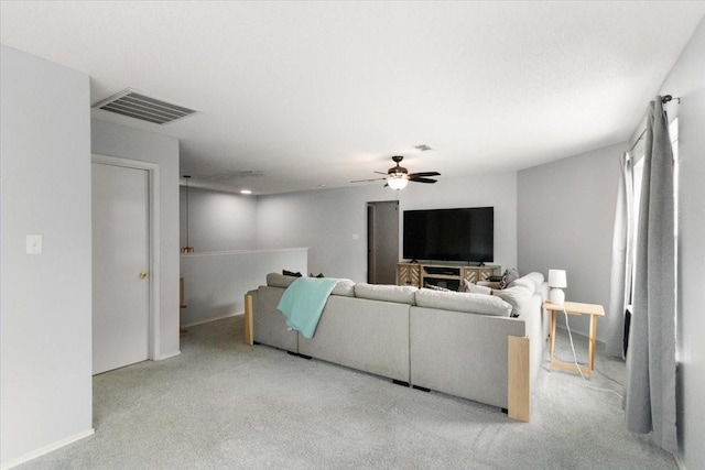 2826 Garden Oaks Pl, Grand Prairie, TX 75052 - carpeted living room featuring ceiling fan and baseboards