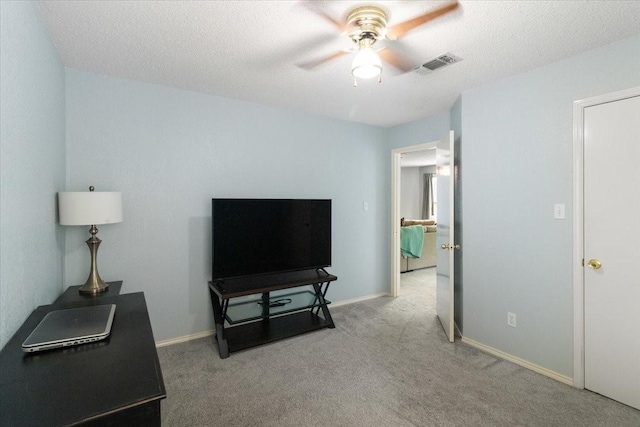 2826 Garden Oaks Pl, Grand Prairie, TX 75052 - living area with a ceiling fan and carpet