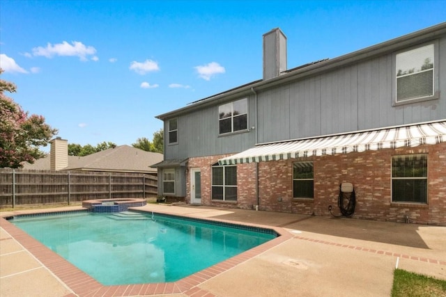 2826 Garden Oaks Pl, Grand Prairie, TX 75052 - view of swimming pool with a fenced backyard, a patio area, and a pool with connected hot tub