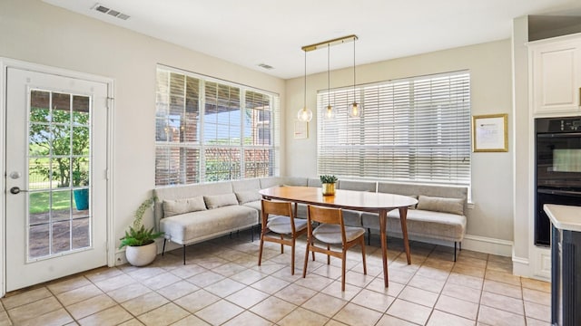 2945 Horseshoe Trl, Frisco, TX 75033 - dining room with breakfast area and light tile patterned floors