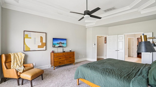 2945 Horseshoe Trl, Frisco, TX 75033 - bedroom with ornamental molding, a tray ceiling, light colored carpet, and a ceiling fan