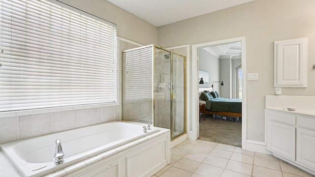 2945 Horseshoe Trl, Frisco, TX 75033 - ensuite bathroom featuring a bath, a shower stall, vanity, and tile patterned floors