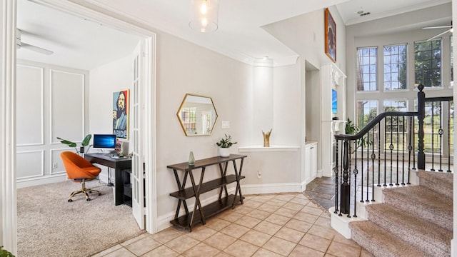 2945 Horseshoe Trl, Frisco, TX 75033 - entrance foyer featuring crown molding, light tile patterned floors, and stairway