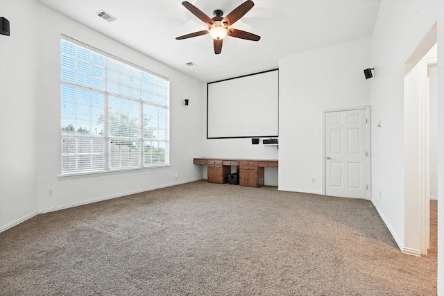 15773 Waterview Dr, Frisco, TX 75035 - carpeted cinema with ceiling fan and built in study area