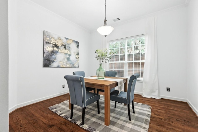 15773 Waterview Dr, Frisco, TX 75035 - dining space with crown molding and dark wood-type flooring