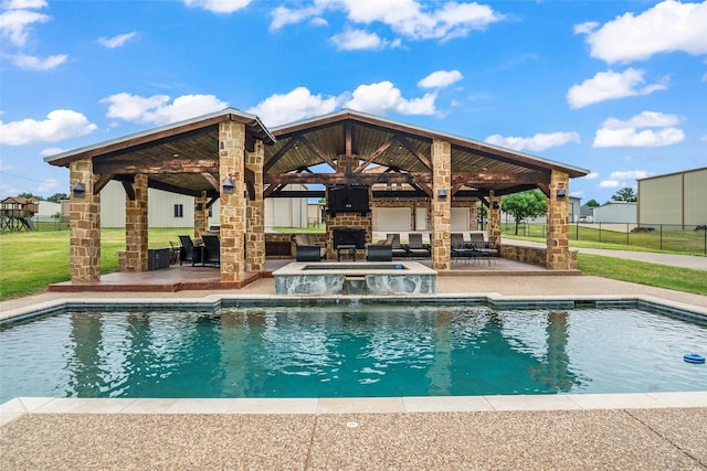 2910 Eagles Nest Ct, Midlothian, TX 76065 - view of pool with a gazebo, a fireplace, a patio, and a pool with connected hot tub