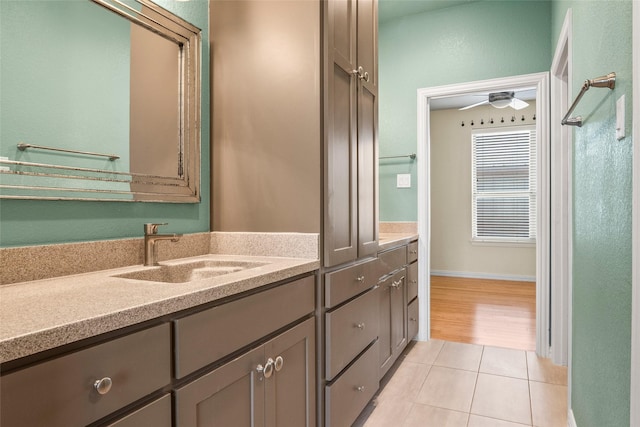 2910 Eagles Nest Ct, Midlothian, TX 76065 - bathroom with vanity, tile patterned flooring, and a ceiling fan